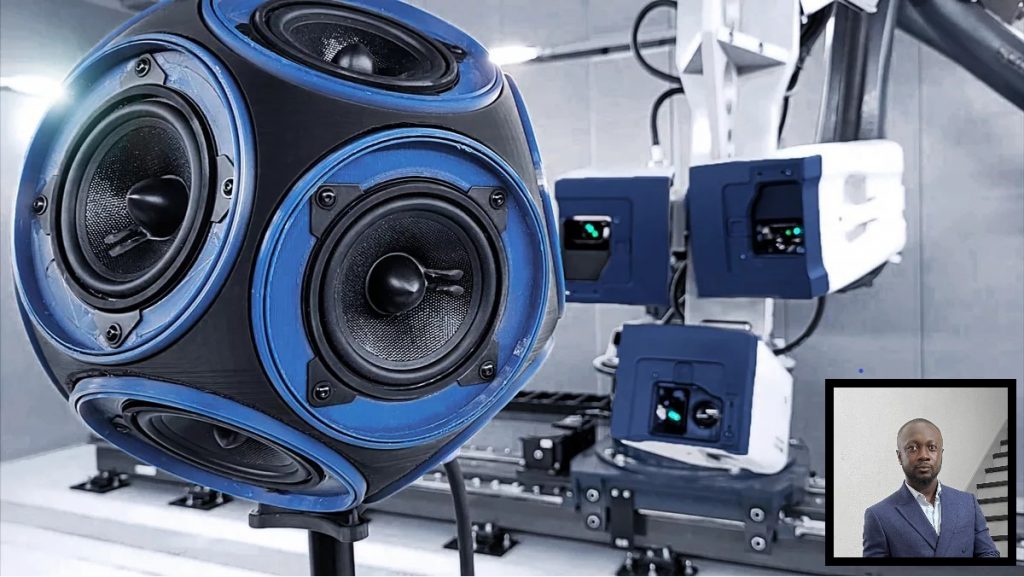 Photo showing a 3D laser doppler vibrometer scanning a dodecahedron loudspeaker. Inset image shows Hubert Owusu of Polytec.